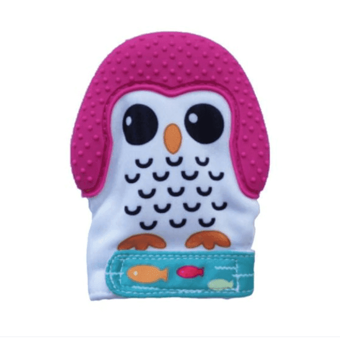 a pink hello kitty cat sits on a bench