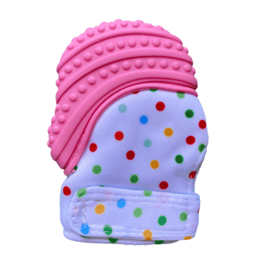 a close up of a pink and pink toothbrush